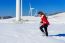 Young Woman Is A Happiness With Camera In Winter Of Sky And Winter Road With Snow And Red Dress