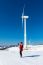 Young Woman Is A Happiness With Camera In Winter Of Sky And Winter Road With Snow And Red Dress