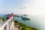 Woman Tourist On Peak Viewpoint Of Island