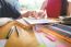 Students Studying And Learning In A Coffee Shop With A Laptop A