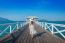 Young Woman Walking On Wooden Bridge In Si Chang Island, Thailand