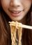 Woman Eating Noodles