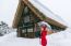 Young Woman In Shirakawa-go Village In Winter, Unesco World Heritage Sites, Japan