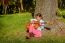 Pretty  Little Girl Playing Guitare In The Park