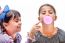 Portraits Of Beautiful Little Girls Blowing Bubbles