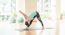 Asian Woman Doing Yoga Indoors