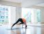 Asian Woman Doing Yoga Indoors