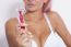 Pink Hair Attractive Woman Hold Pink Female Shaver In Hand