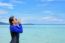 Asian Woman Shouting With Hands On The Sea In Summer, Thailand