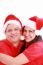 Couple Wearing Santa Hats