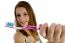 Woman With Toothbrush