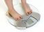 Childs Feet On Weighing Scale