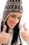 Woman With Woolen Cap And Thumbs Up