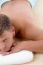 Man Lying On Mat To Take Spa