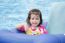 Baby Girl Floating In Swimming Pool