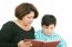 Mother And Son Reading A Book 