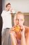 Couple In Kitchen Having Breakfast