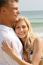 Smiling Young Couple At Beach