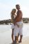 Young Couple Standing At Beach