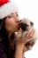 Female With Hat And Kissing Puppy