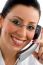 smiling lady talking over landline