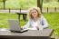 Business Lady Using Laptop In Park