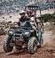 Man Riding Quad Bike