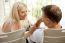 Couple Laughing On Balcony