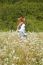 Woman Running In Meadow