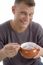 Smiling Man Eating Cornflakes