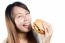 Asian Girl Eating Burger