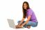 Smiling Teenage Girl Using Laptop