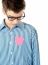 Pink paper heart shape in boy shirt