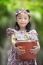 Female Child Holding Bucket