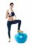 Fitness Lady Standing On Gym Ball