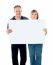 Aged Couple Holding Blank Board