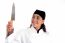 Smiling Female Chef Holding Knife