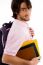 Smiling Boy Holding Bag And Books