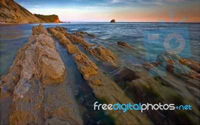 01574_manofwarlulworth Stock Photo