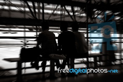 3 Men Traveler Shadows Sitting Stock Photo