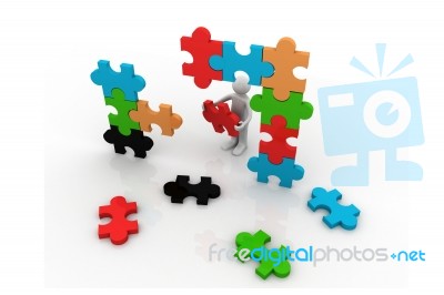 3d Man Building A Puzzle Stock Image