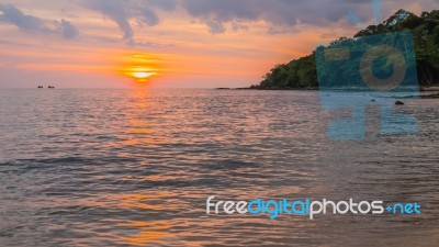 A Beach Scene With Sunset In The Background At Kood Island, Thai… Stock Photo