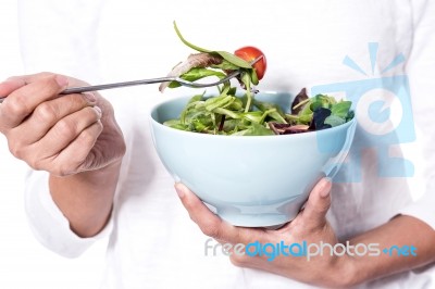 A Bowl Of Fresh Delicious Leafy Green Salad Stock Photo