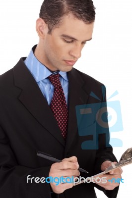 A Business Man With Notepad Stock Photo