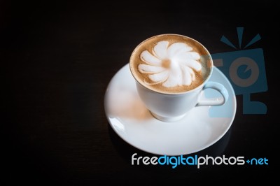 A Cup Of Hot Latte Art Coffee Stock Photo