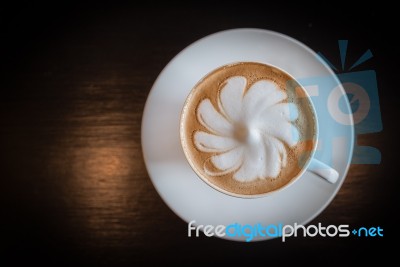 A Cup Of Hot Latte Art Coffee Stock Photo