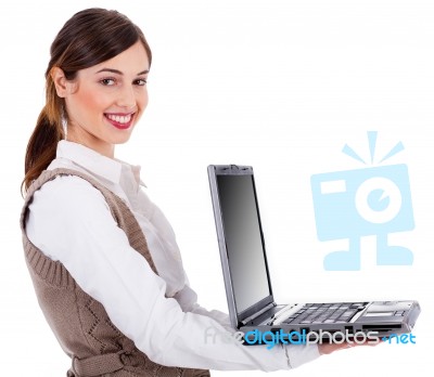 A Girl Holding Laptop Stock Photo