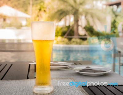 A Glass Of Beer On The Table Stock Photo