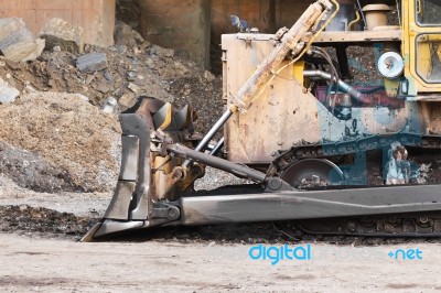 A Large  Bulldozer In Construction Site Stock Photo