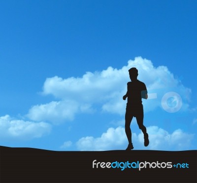 A Lone Runner On The Horizon Stock Image